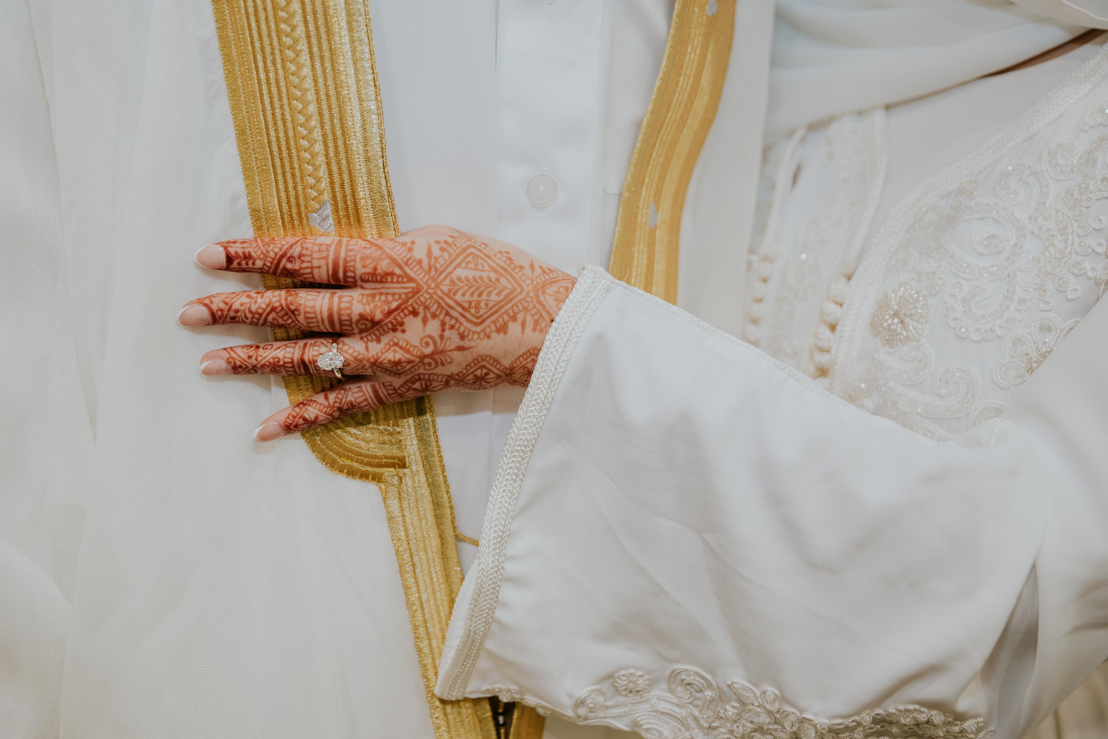 Wedding ceremony — couple holding hands, different angle